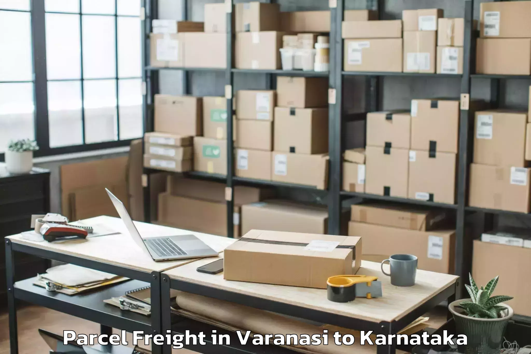 Easy Varanasi to Reva University Bangalore Parcel Freight Booking